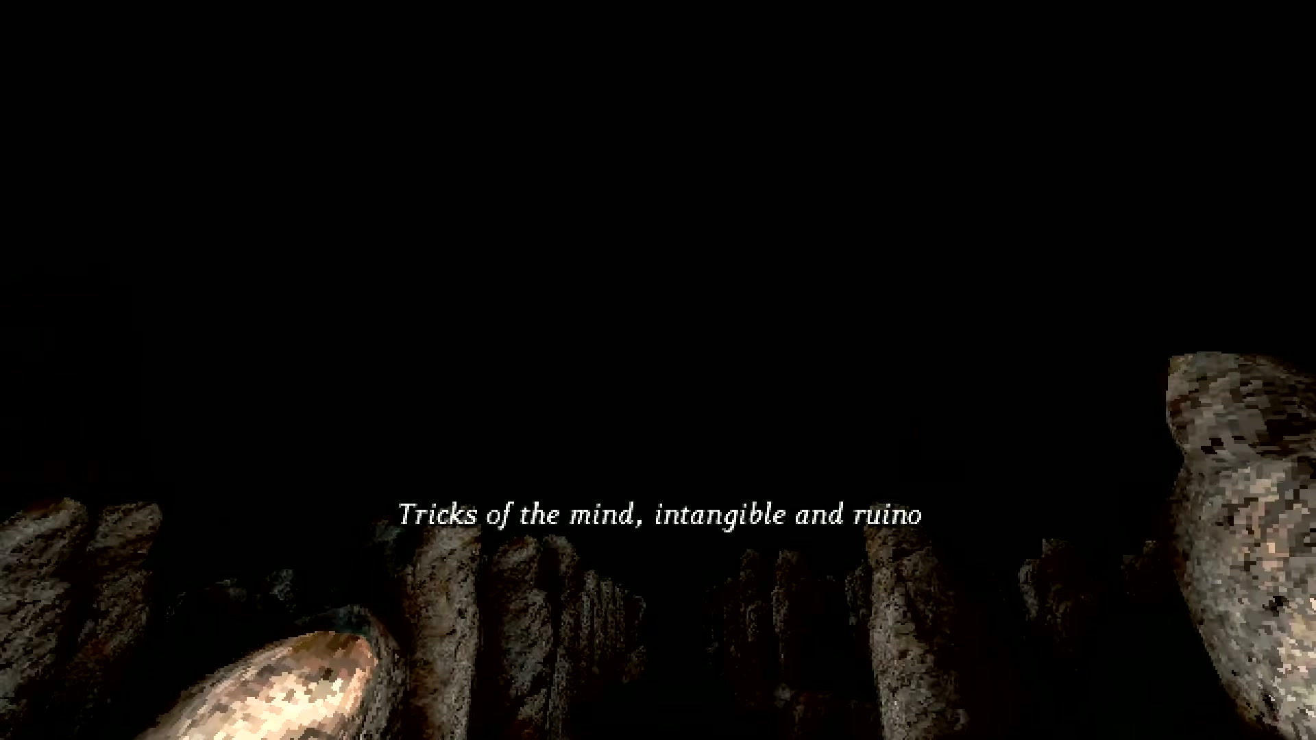 Multiple stone statues at the bottom of the megastructure, all in reaching poses